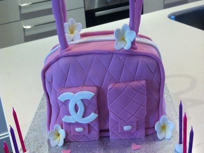 Designer handbag. Hand carved marbled mud cake with white chocolate ganache.<br>Posted: December 10th, 2019.