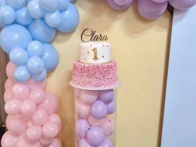 Bottom tier chocolate mud with chocolate ganache. Top tier vanilla sponge with jam and buttercream. Hand made fondant ruffles and painted gold accents<br>Posted: May 29th, 2022